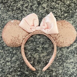 Disney Rose Gold Sequin Minnie Mouse Ears Headband with Pink Bow